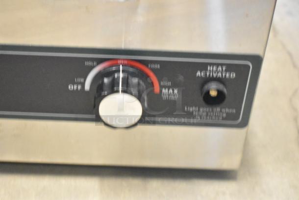 Stainless steel food warmer with control dial and heat activation switch, including models: Winco FW-S600 and Avantco. 115V, 1-phase.