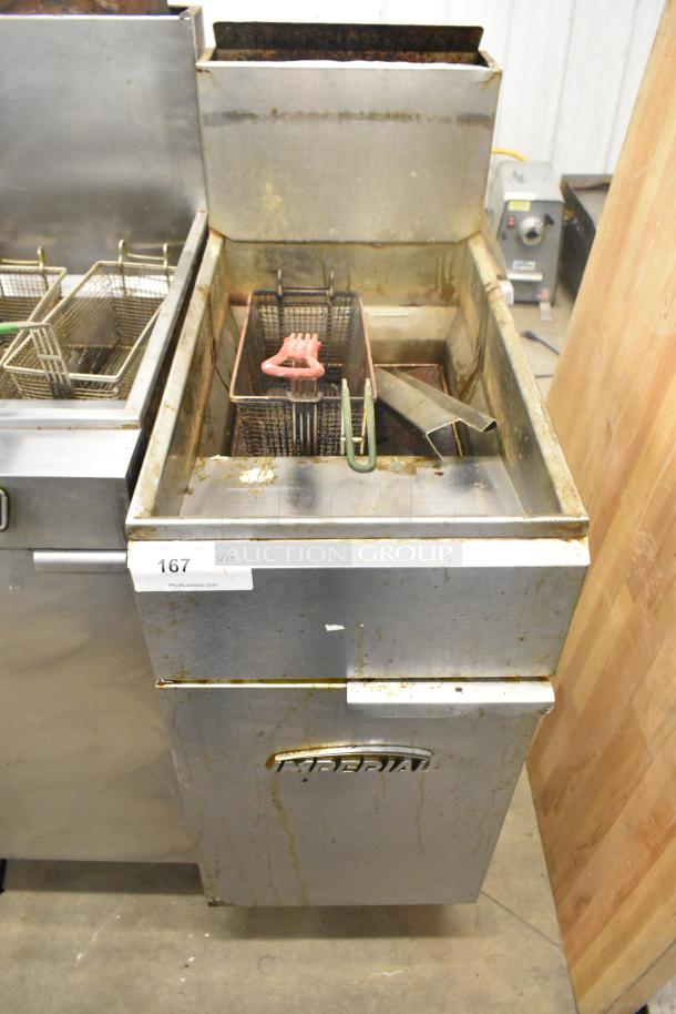 Imperial Stainless Steel Commercial Gas Fryer, floor style, well-used condition, visible oil stains, model number unknown.