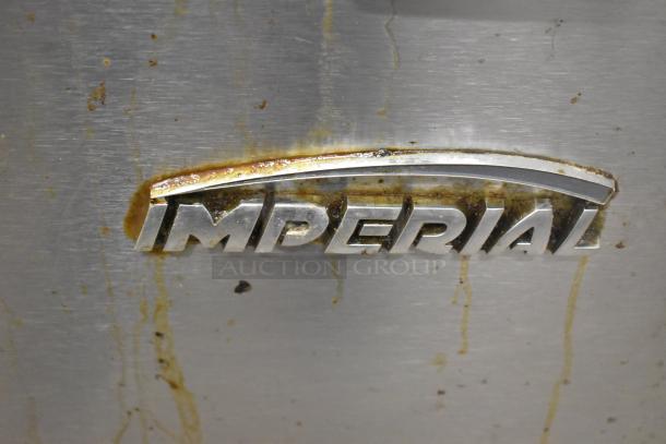 Imperial stainless steel commercial gas fryer, floor style, slight grease marks on logo.
