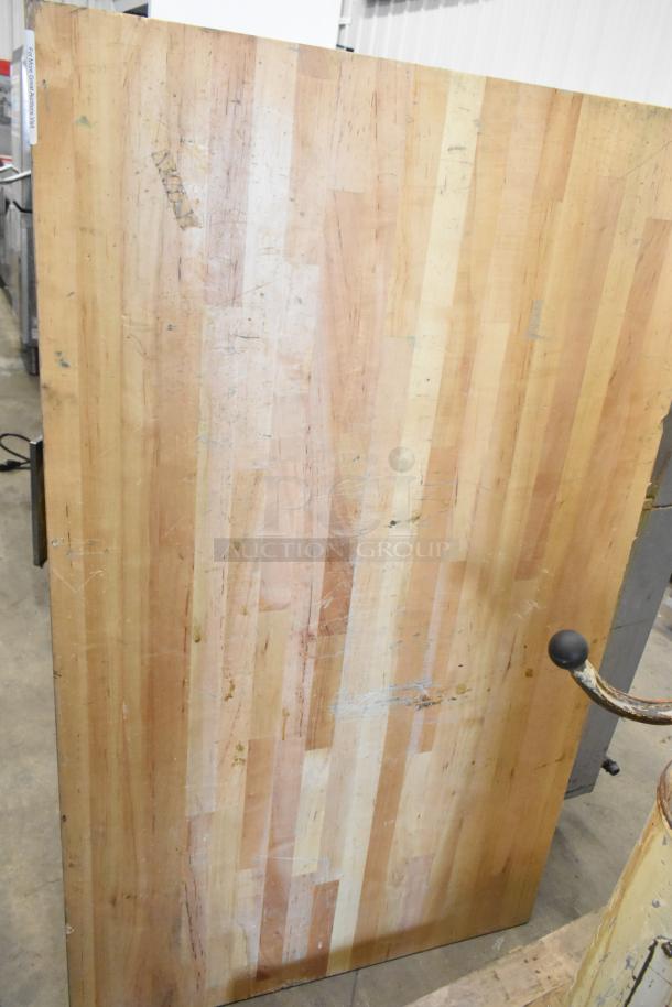 Wooden tabletop with a striped pattern, minor scratches, and wear. Durable surface ideal for DIY projects or replacement.