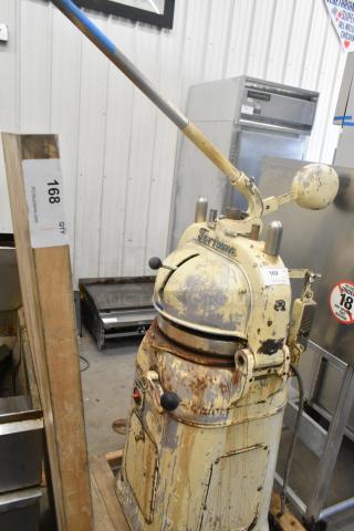 Fortuna metal commercial floor-style dough divider, vintage condition, signs of wear, handle and label visible.