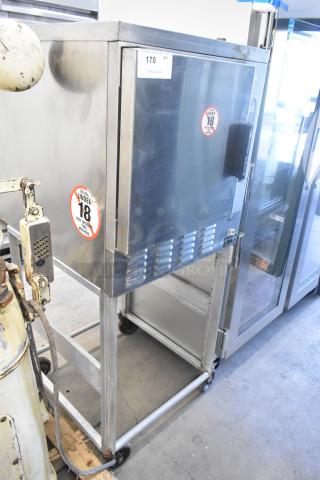 Hobart HC24EA5 stainless steel steam cabinet, commercial electric, single deck, on wheels, 208/240V, visible safety label.