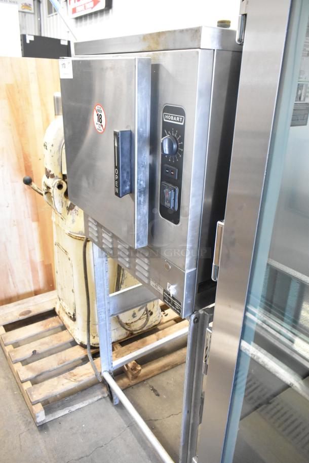 Hobart HC24EA5 stainless steel steam cabinet, single deck, electric, 208/240V, 3/1 phase, used condition, visible labels.