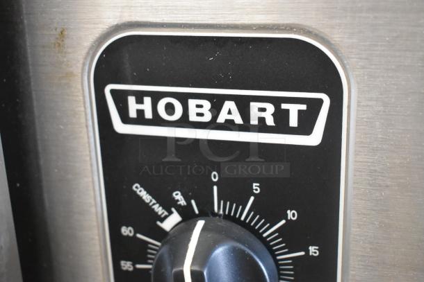 Hobart HC24EA5 control panel with brand logo and knob for steam cabinet settings. Stainless steel design.