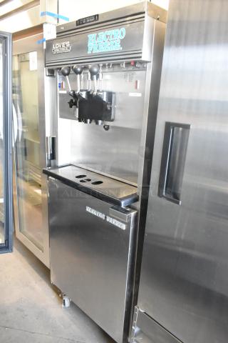 Electro Freeze 30TNCAB-213 stainless steel 2-flavor soft serve ice cream machine with twist, on casters. 230V, 1-phase.