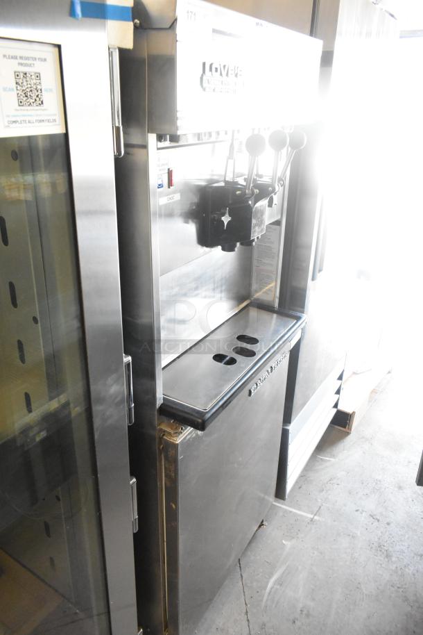 Electro Freeze 30TNCAB-213 stainless steel 2-flavor soft serve ice cream machine, commercial floor model on casters, 230V, 1 phase.