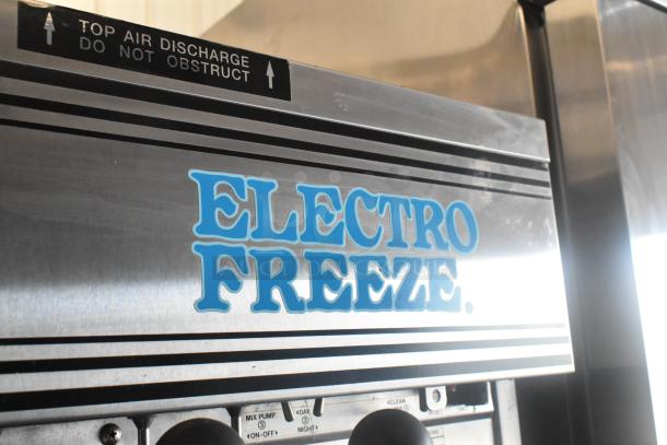 Electro Freeze 30TNCAB-213 soft serve machine, stainless steel, dual flavor with twist, commercial casters, 230V, 1-phase.
