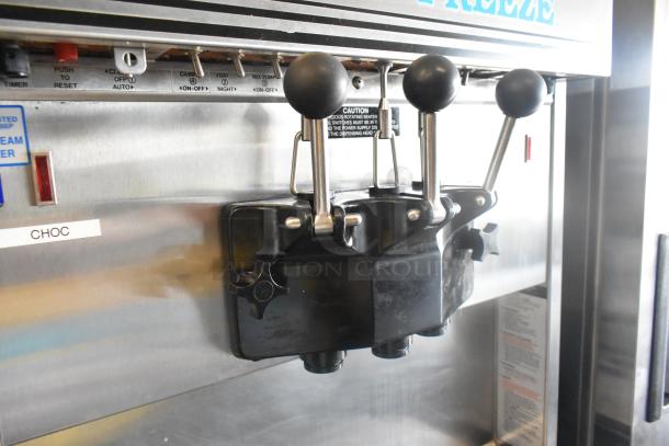 Electro Freeze 30TNCAB-213 stainless steel soft serve machine, 2-flavor w/ twist, commercial casters, 230V, 1 phase.