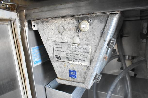 Electro Freeze 30TNCAB-213 stainless steel 2-flavor soft serve machine on casters, includes labels indicating model and specs.