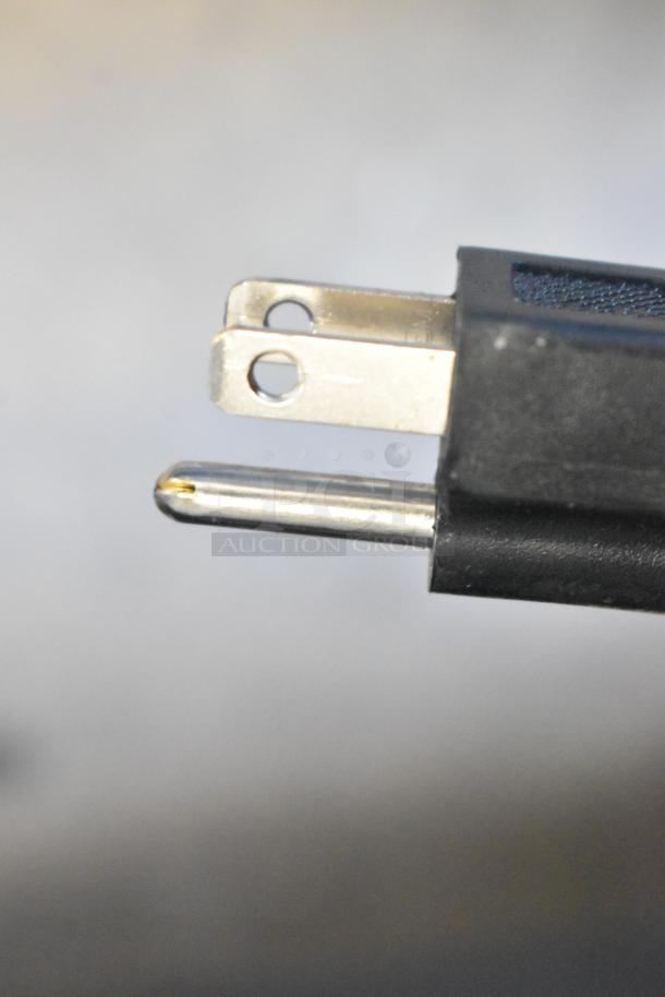 Close-up of a three-prong power plug for the Avantco 178A23RHC commercial cooler, indicating standard 115 Volts, 1 Phase.