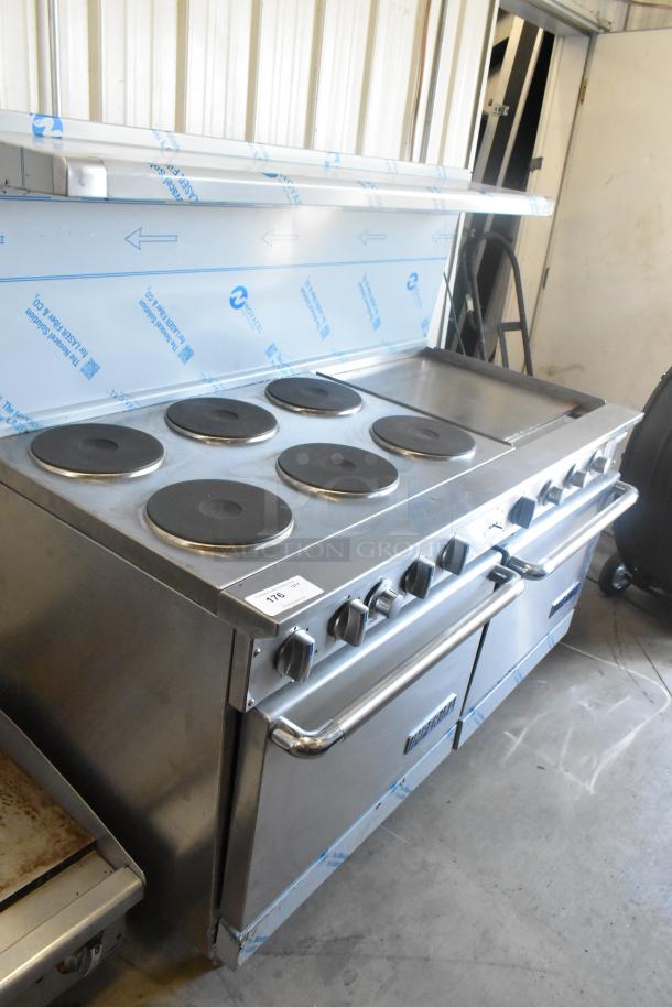 Imperial stainless steel electric 6-burner range with right-side griddle, 2 ovens, overshelf, and backsplash; excellent condition.