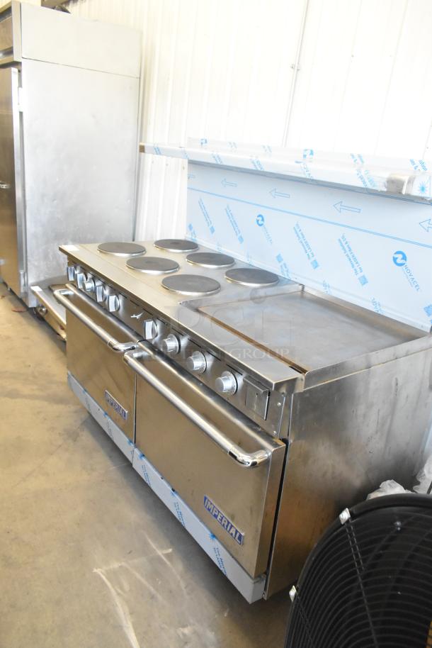 Imperial stainless steel commercial electric range with 6 burners, griddle, 2 ovens, over shelf, and backsplash. Excellent condition.