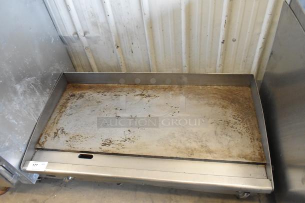 Star stainless steel commercial countertop flat top griddle with thermostatic controls, moderate wear, model number tag 177.