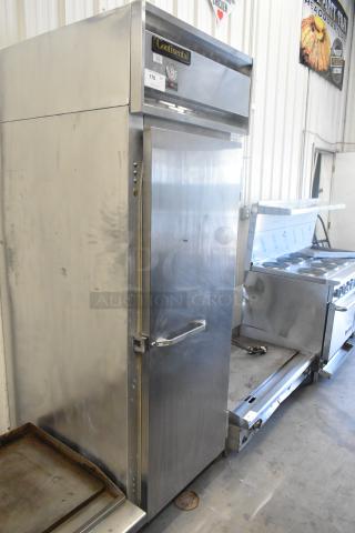 Continental 1FE stainless steel commercial reach-in freezer, single door, 115V, visible control panel, used condition.