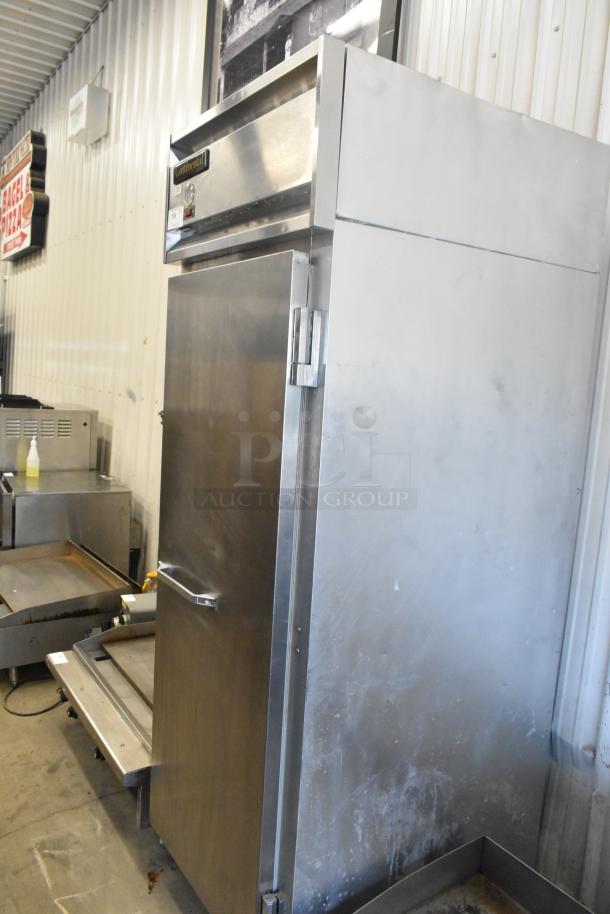 Continental 1FE stainless steel single door reach-in freezer, commercial-grade, 115 volts, visible model label, used condition.