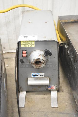 Univex PM91 commercial countertop meat grinder, metal construction, 115 volts, 1 phase, visible wear, Univex label.