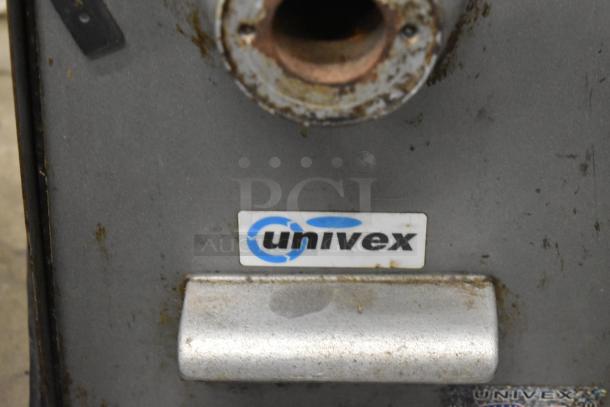 Univex PM91 metal commercial countertop meat grinder, 115 volts, 1 phase. Visible Univex logo, moderate wear.