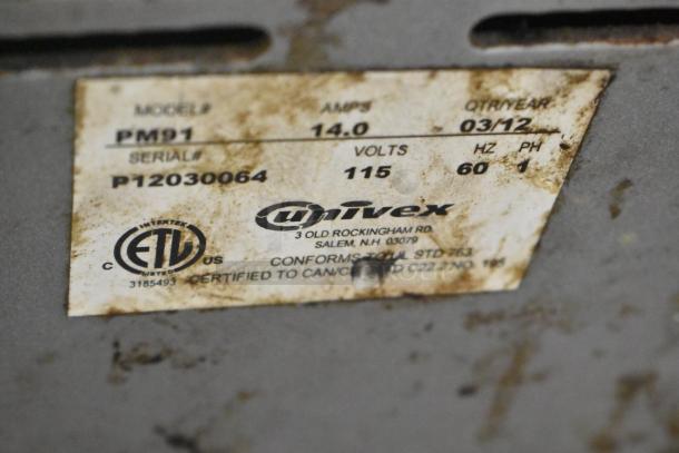 Univex PM91 metal commercial meat grinder label showing model, volts, amps, and certification details.