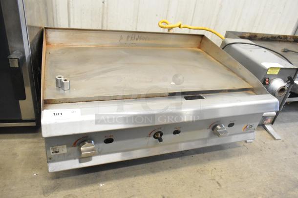 2023 CPG 351GMCPG36NL stainless steel countertop natural gas flat top griddle, 90,000 BTU, used condition.