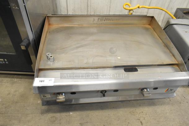 2023 CPG 351GMCPG36NL stainless steel flat top griddle, natural gas, 90,000 BTU, commercial use, fair condition.