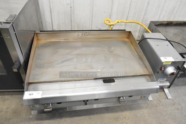 2023 CPG 351GMCPG36NL stainless steel natural gas griddle, 90,000 BTU, commercial countertop, used condition, visible controls.