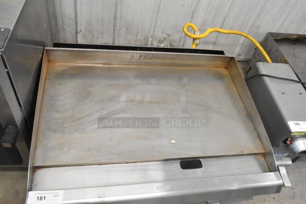 2023 CPG 351GMCPG36NL stainless steel flat top griddle, natural gas, 90,000 BTU, gently used with surface discoloration.