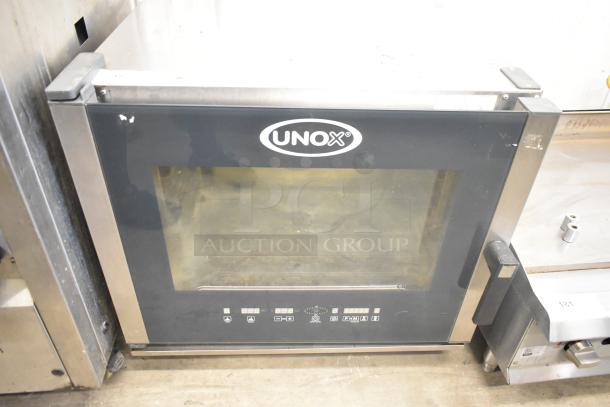 Cadco Unox XAV305 stainless steel convection oven, commercial countertop model, 208-240 volts, electric powered.