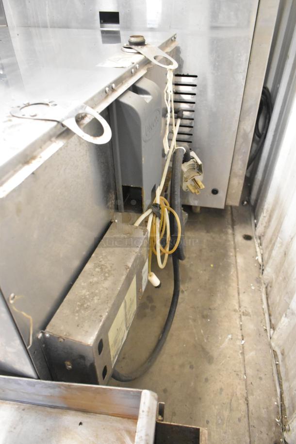 Cadco Unox XAV305 stainless steel commercial convection oven, 208-240V, shown with plug and wiring, in good condition.