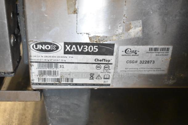 Cadco Unox XAV305 commercial convection oven, stainless steel, electric, 208-240V, visible labels with model details.