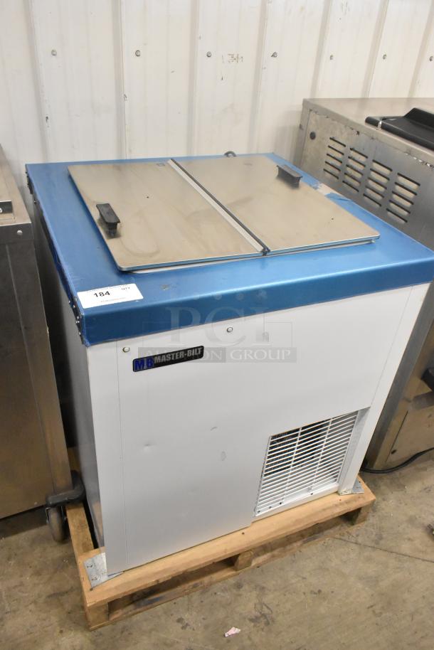 Brand new 2022 Master-Bilt DC-4D commercial chest freezer, 115 volts, 1 phase, metal construction, blue and white finish, on pallet.