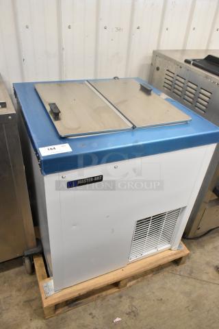 Brand new 2022 Master-Bilt DC-4D commercial chest freezer, 115 volts, 1 phase, metal construction, blue and white finish, on pallet.