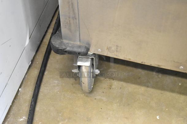 2021 Aladdin Temp-Rite DH08 stainless steel commercial tray return. Visible caster, 208-240V, 1 phase. Light wear.