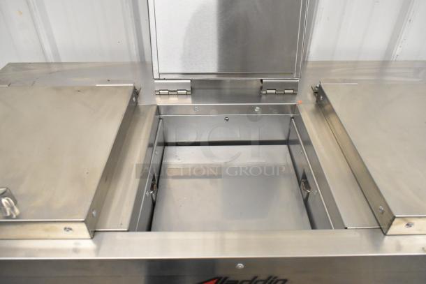 2021 Aladdin Temp-Rite DH08 stainless steel tray return with commercial casters, 208-240 volts, 1 phase, excellent condition.