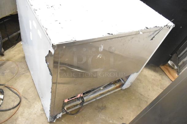 Stainless steel commercial grab-n-go merchandiser, horizontal, visible dents and scratches, needs repair, for parts or refurbishment.