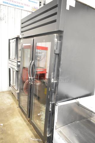 2020 True STG2RPTVLD-2G-2S-HC metal commercial cooler, 2 glass doors, poly-coated racks, 115V, 1 phase, good condition.
