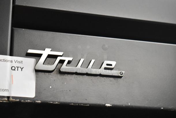 "True" logo on 2020 True STG2RPTVLD-2G-2S-HC cooler, metal finish, commercial 2-door merchandiser with poly-coated racks.