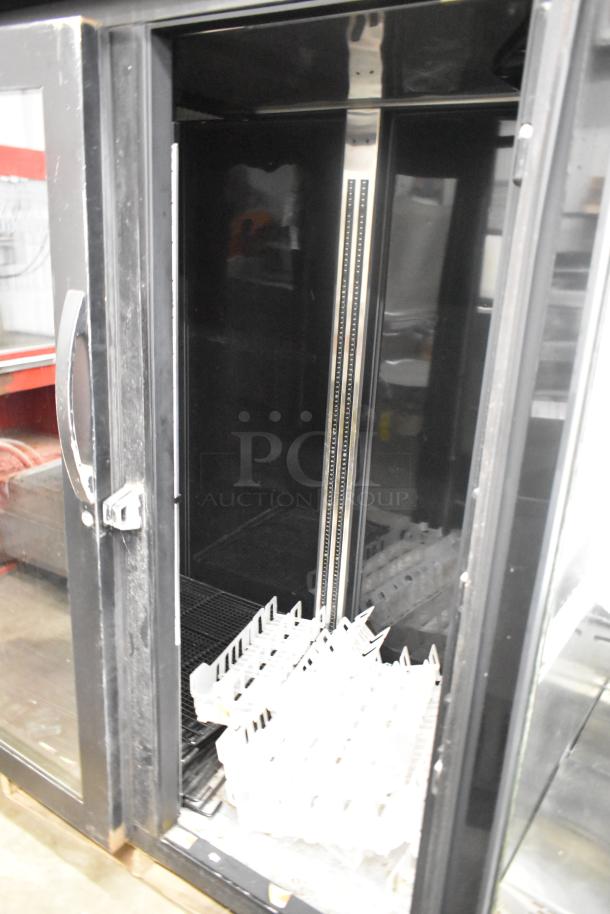 2020 True STG2RPTVLD-2G-2S-HC commercial cooler, 2-door, poly-coated racks, 115 volts, good condition.