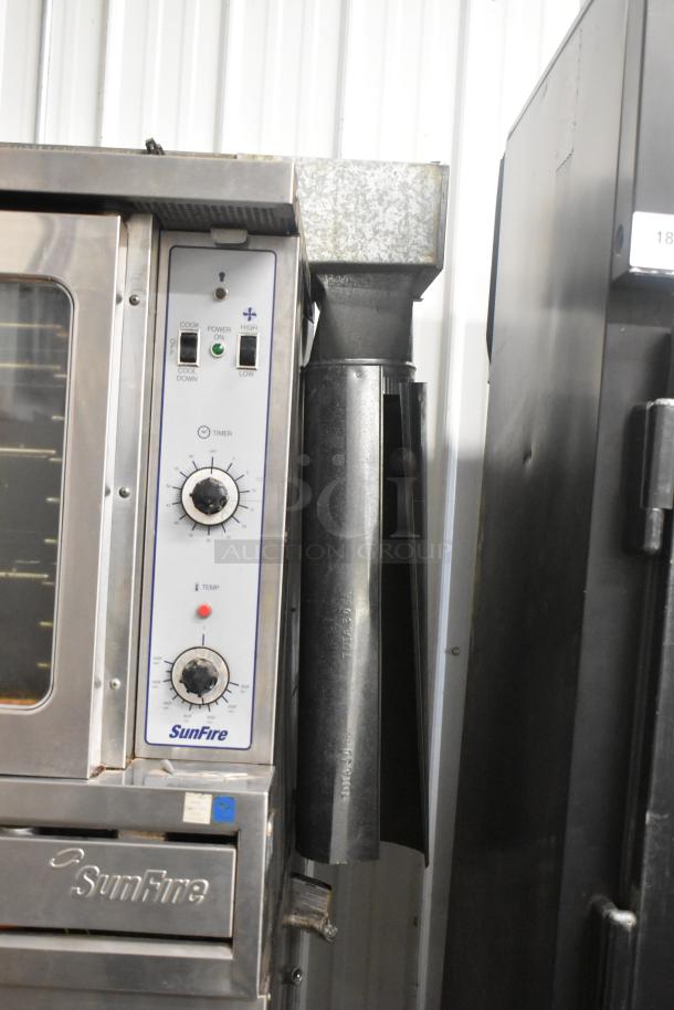 Garland SunFire stainless steel full-size convection oven with view-through doors, metal racks, and thermostatic controls.