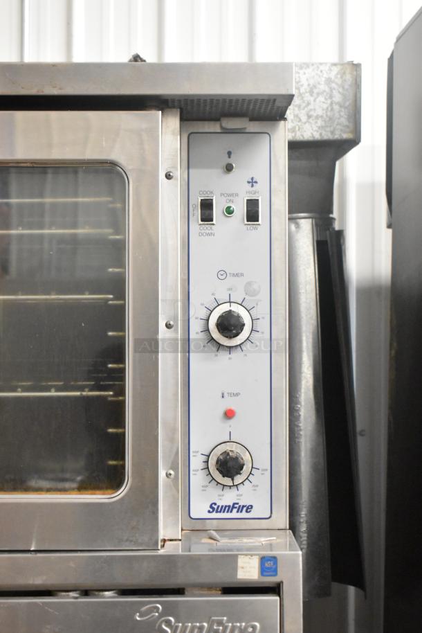 Garland SunFire stainless steel commercial convection oven with view-through doors, metal racks, and thermostatic controls.