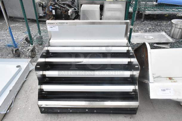 Brand new Regency 600LDR3024S stainless steel bottle merchandiser, no legs, with minor scratches. Tags indicate model.