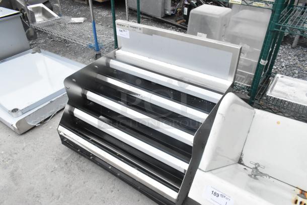 BRAND NEW Regency 600LDR3024S stainless steel bottle merchandiser, scratch and dent condition, no legs included.