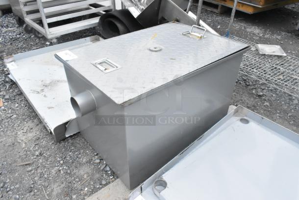 Alt Text: Regency 600GT25 grease trap, 50 lb. capacity, 25 GPM, scratch and dent, with 3" non-threaded connections.