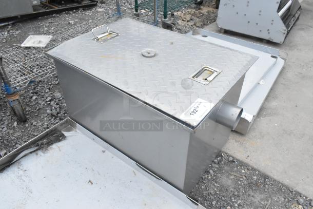 BRAND NEW SCRATCH AND DENT Regency 600GT25 50 lb. grease trap, 25 GPM, with 3" non-threaded connections, minor surface wear.