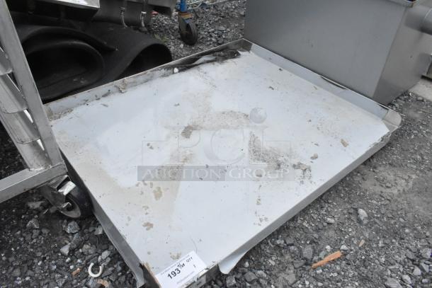 Regency 30" x 36" stainless steel equipment stand, 16-gauge, scratch and dent, no legs, new condition, visible wear.