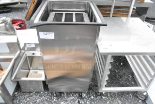 BRAND NEW SCRATCH AND DENT! Lakeside stainless steel tray return, commercial casters, visible scratches and dents, auction tag 195.