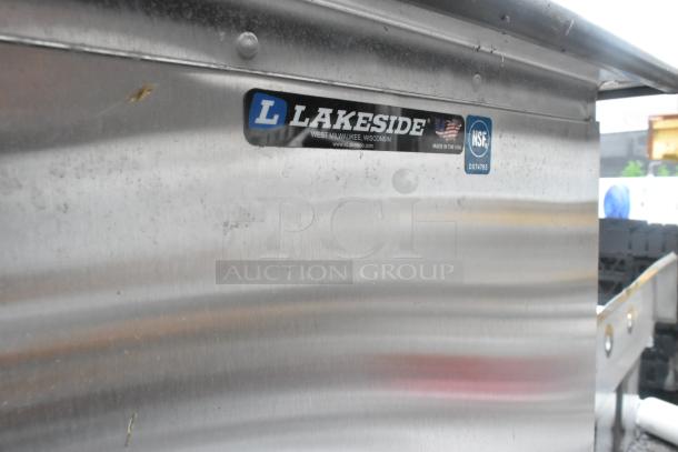 BRAND NEW SCRATCH AND DENT Lakeside stainless steel tray return on commercial casters, label indicates NSF certified.