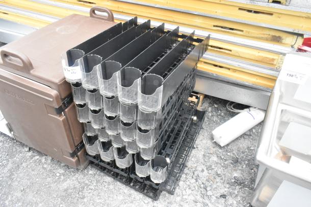 Lot of poly drink sliders, black with clear dividers, stacked in a storage configuration. Quantity and condition tags visible.