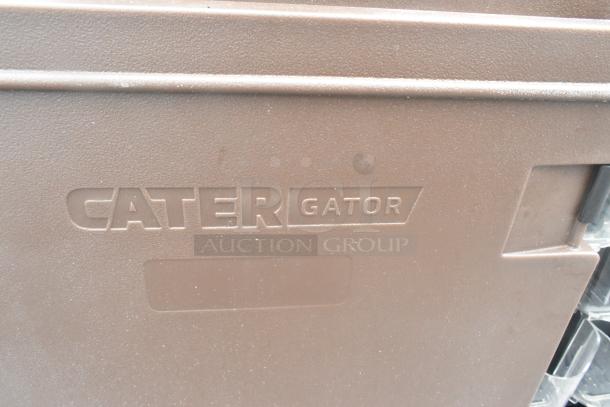 BRAND NEW SCRATCH AND DENT! CaterGator brown poly insulated food carrying case with "CaterGator" embossed on side.