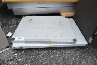 Brand new Regency 24"x36" 18-gauge stainless steel work table top, no legs, slight dent, commercial use, galvanized undershelf.