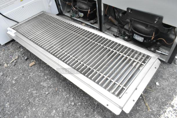 Brand new Regency stainless steel floor trough, minor scratches, durable construction, ideal for commercial use.